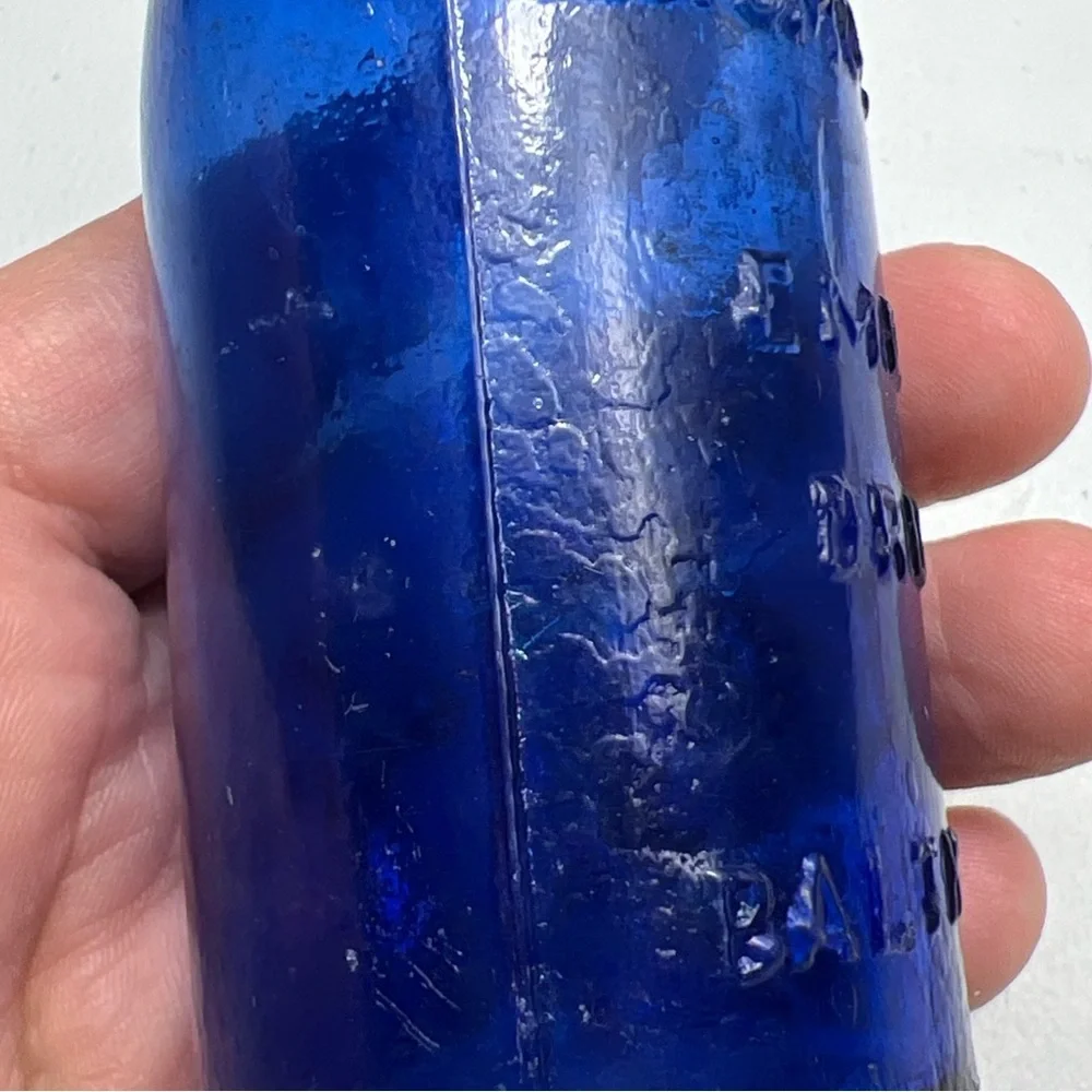 Lot of 4 vintage Colbalt Blue Glass Bottles